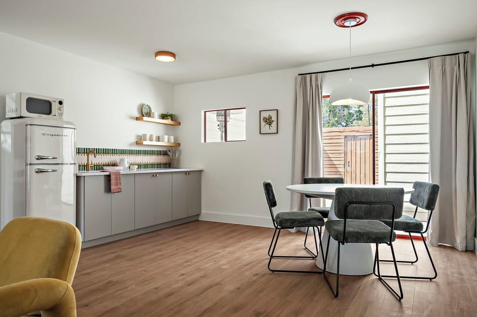 Deluxe Studio Suite | Private kitchen | Fridge, microwave, electric kettle