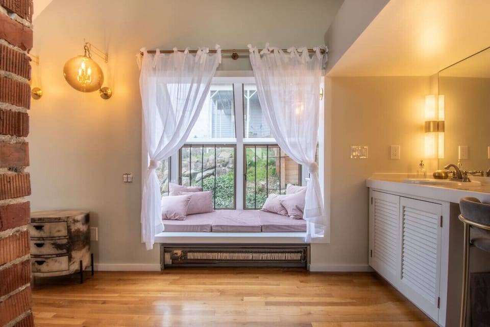 The bedroom even has a stunning window reading nook. Cuddle up in this area for maximum relaxation.