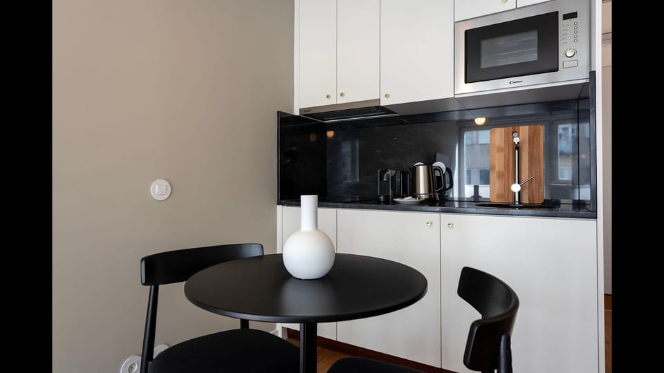 Practical kitchenette equipped with all the appliances required for your basic needs, during your stay #modern #charming