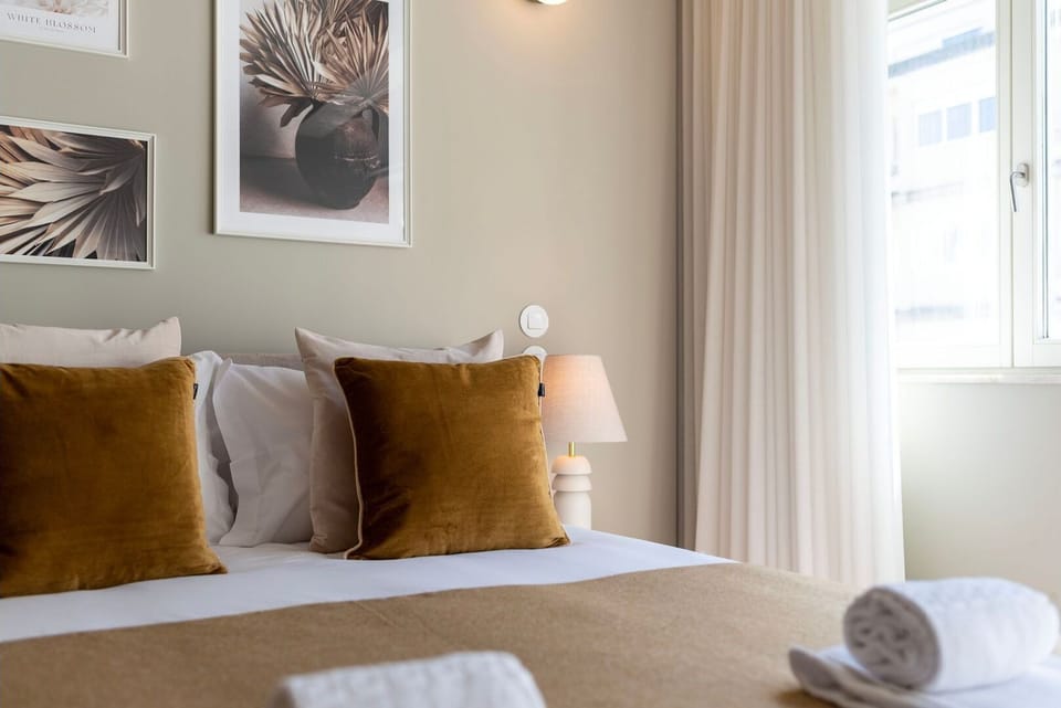 A close-up of the inviting double bed, adorned with plush pillows and a throw, beckoning you to unwind after a day of exploration.
#Bedroom #ComfortableBed #LovelyStay