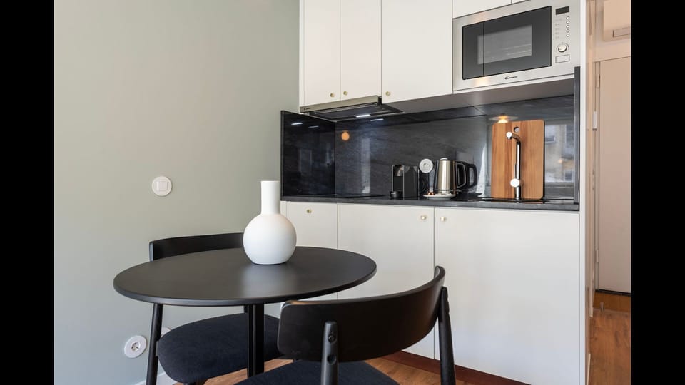Practical kitchenette equipped with all the appliances required for your basic needs, during your stay #modern #charming