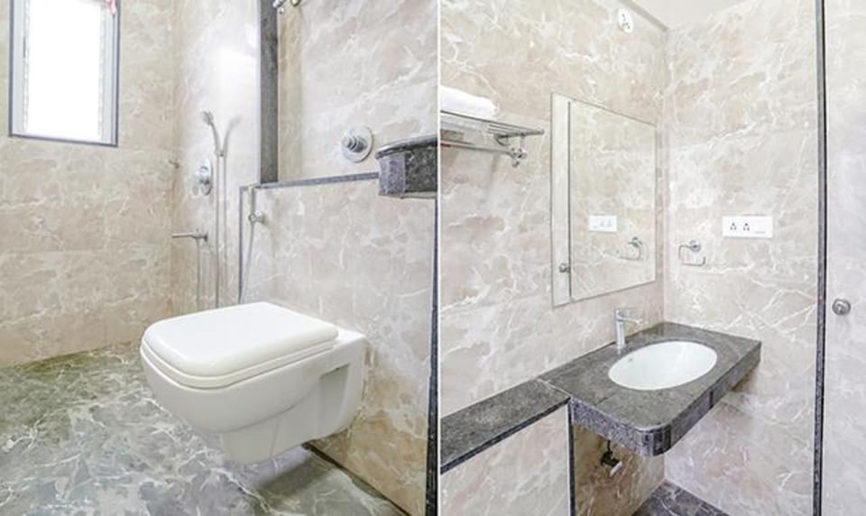 Deluxe Room | Bathroom | Shower, rainfall showerhead, free toiletries, towels