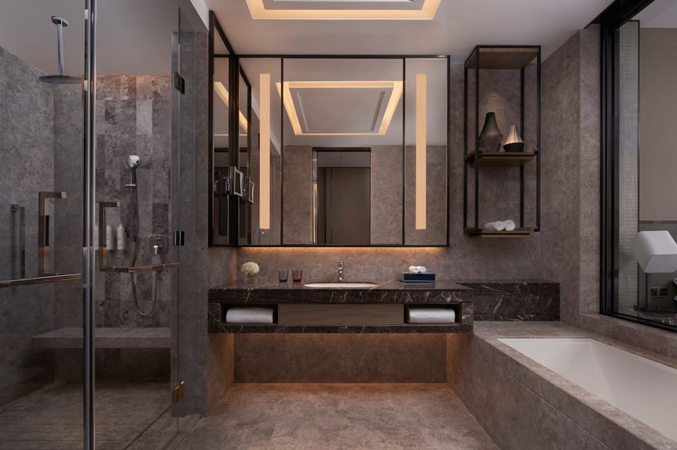 Separate tub and shower, rainfall showerhead, free toiletries