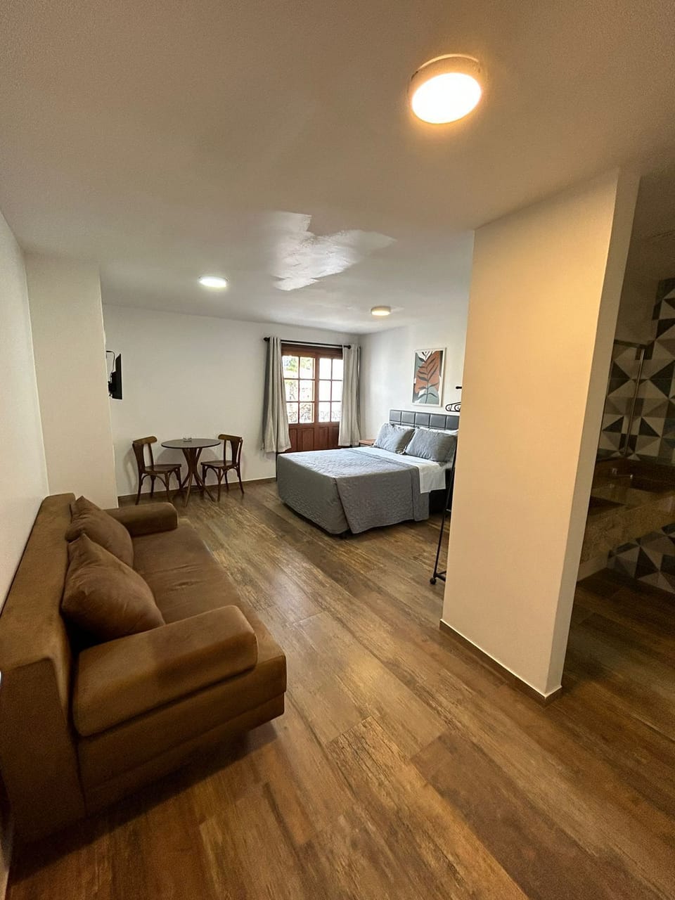 Standard Triple Room | Desk, laptop workspace, blackout drapes, iron/ironing board