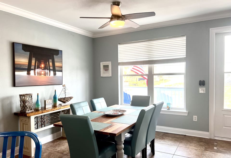 Dining area, sits 6 persons & plus 4 chairs around the kitchen island. 
