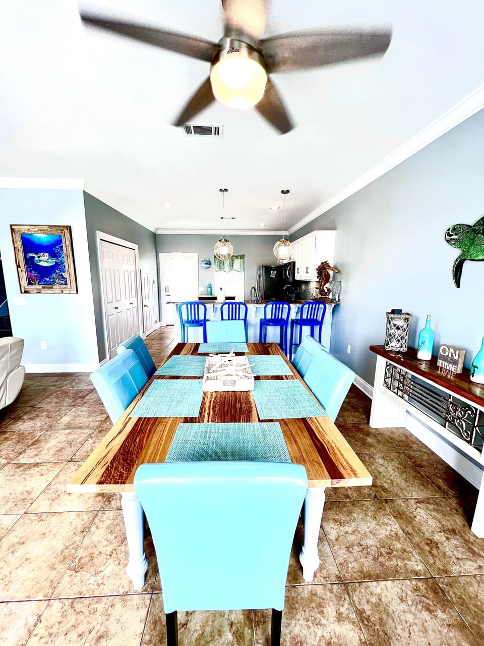 Dining area with Gulf views sitting 6 people at table & 4 sitting at kitchen bar