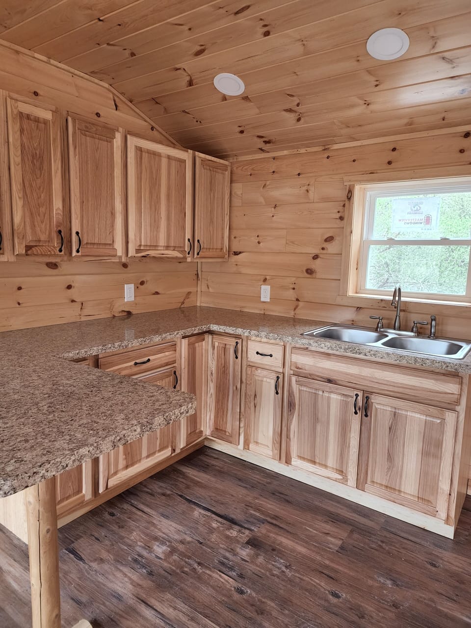 Kitchenette includes appliances not pictured here.