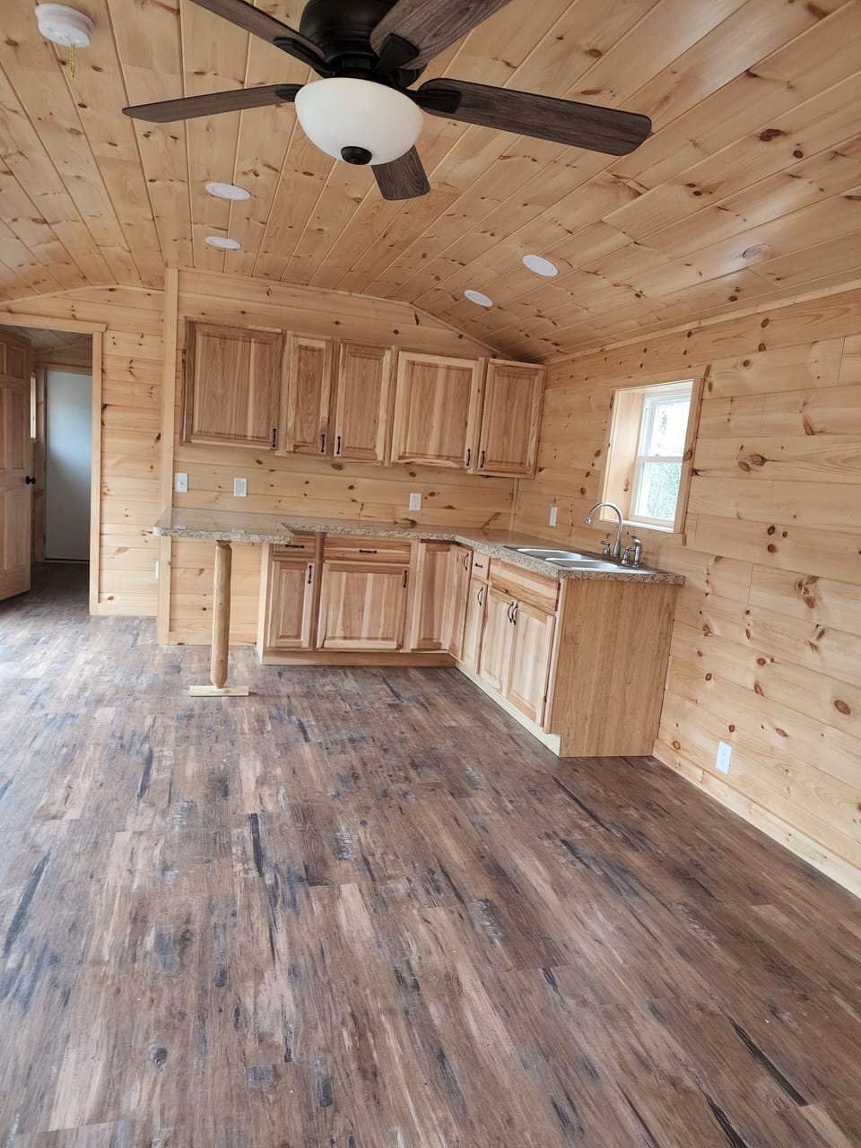 A view of island kitchenette before appliances