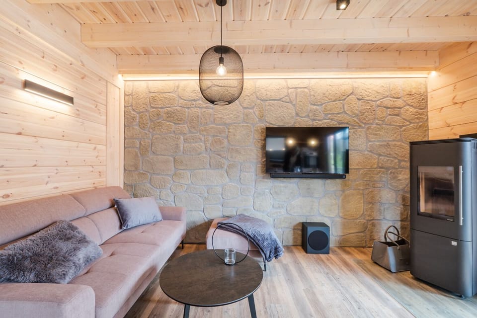 Premium House | Living area | 50-inch Smart TV with satellite channels, TV, fireplace