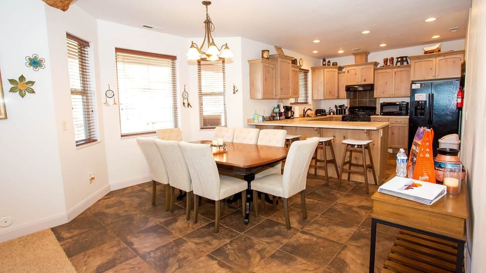 The gourmet kitchen is fully stocked and has everything you need to prepare delicious meals. The dining table offers seating for 6.