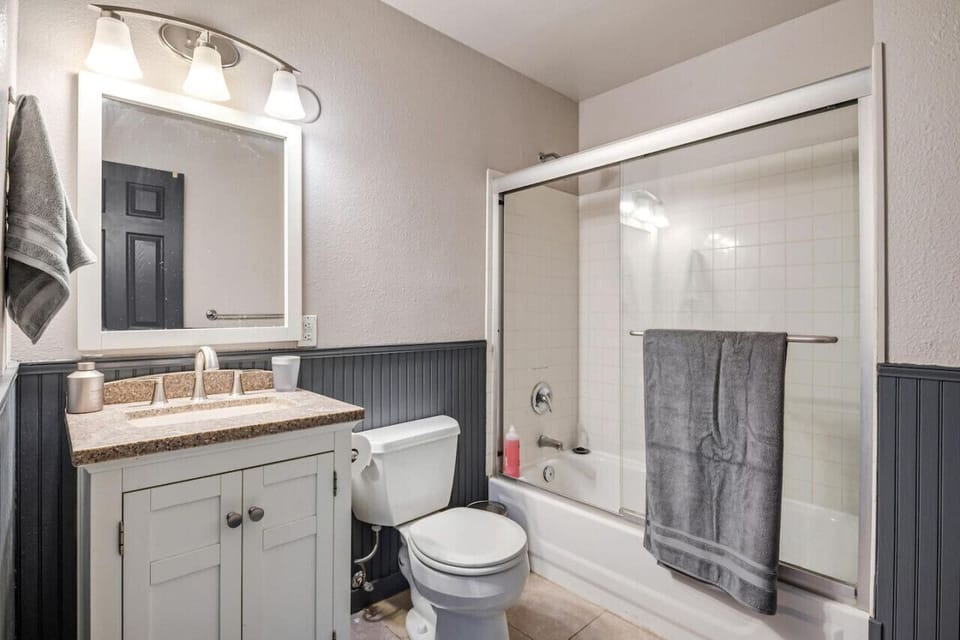 Bright clean bathroom with a tub