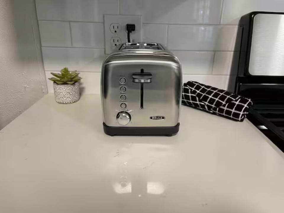 Toast perfection: Our reliable toaster, your breakfast companion.