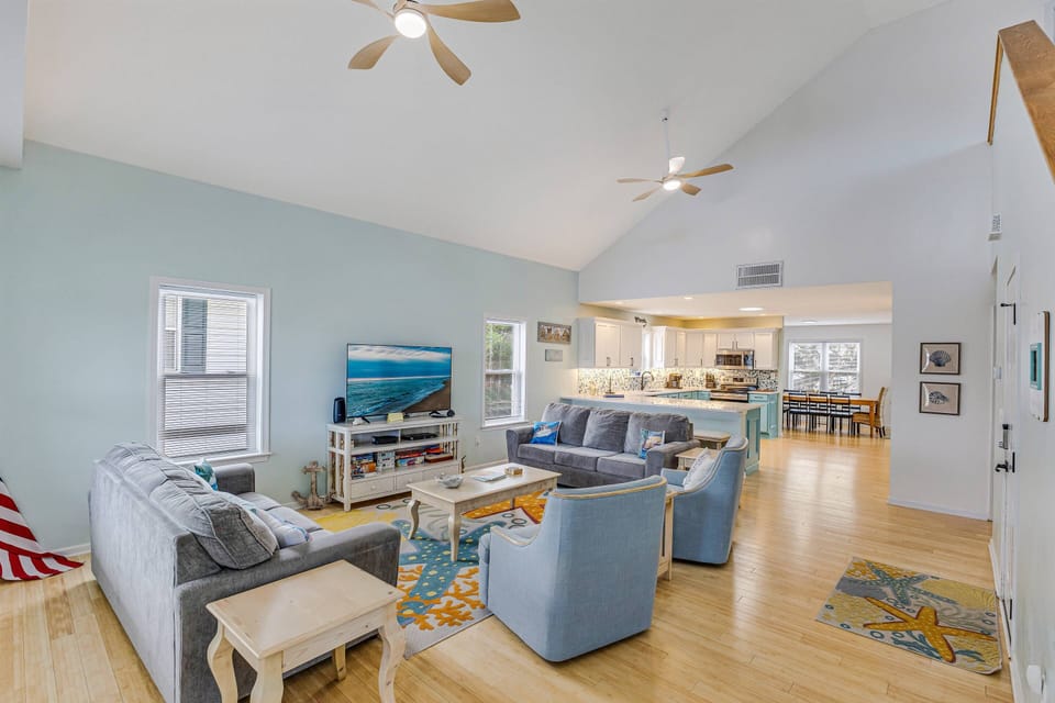 Large, Open & Airy. This Living Room / Kitchen & Dining Area allow everyone to be together while immersed in their own activities.