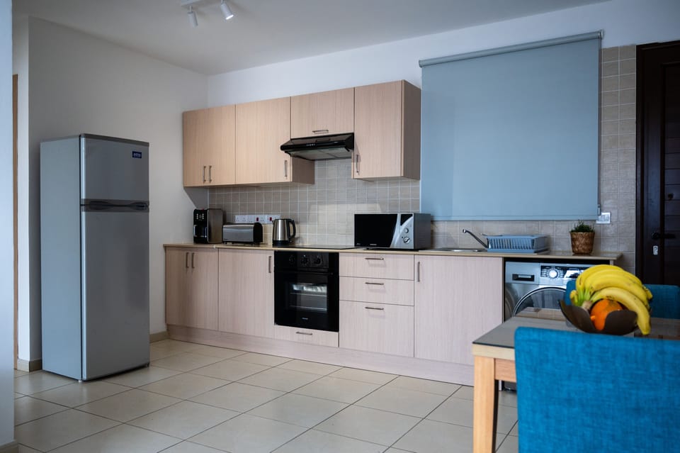 Superior Apartment, 1 Bedroom, Pool View | Private kitchen | Full-size fridge, microwave, oven, stovetop
