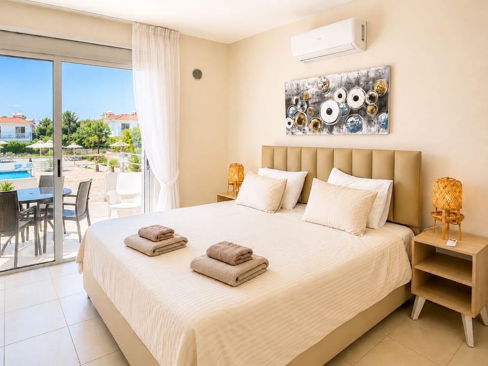 Superior Apartment, 1 Bedroom, Pool View | 1 bedroom, in-room safe, laptop workspace, soundproofing