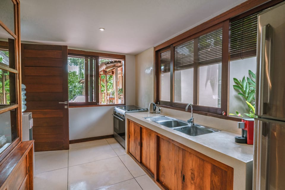 Superior Villa | Private kitchen | Fridge, microwave, coffee/tea maker, cookware/dishes/utensils