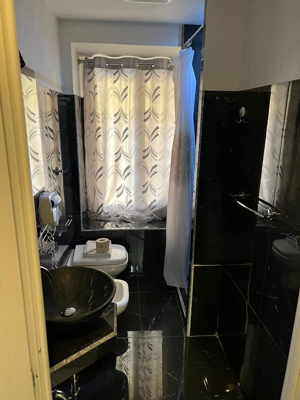 Rainfall showerhead, towels