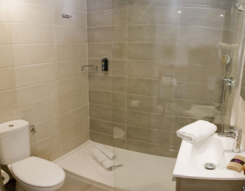 Shower, free toiletries, hair dryer, towels