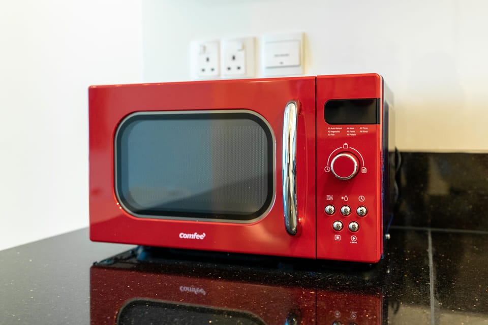 Panoramic Apartment | Private kitchen | Full-size fridge, microwave, oven, stovetop