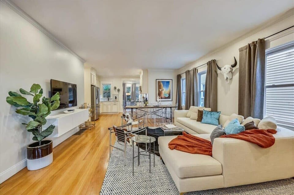 Open Concept Living Room | XL Flat Screen TV | Natural Light | First Floor
