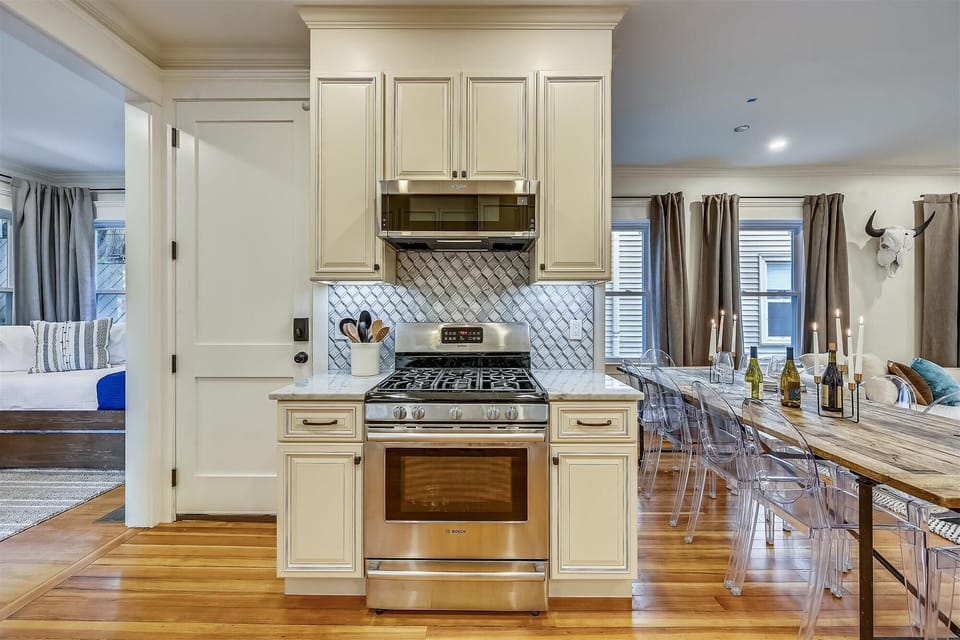 Open Concept Chef's Kitchen | Fully Stocked | Open to Dining | First Floor

