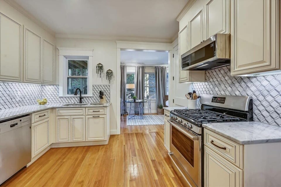 Open Concept Chef's Kitchen | Fully Stocked | Open to Dining | First Floor

