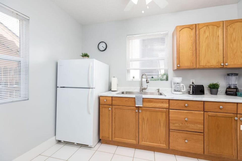 Kitchen space with wooden cabinets