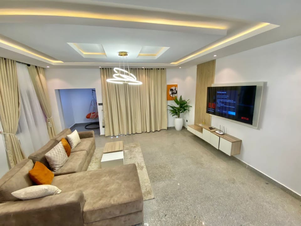 Luxury Apartment | Living area | 65-inch Smart TV with digital channels, TV, Netflix