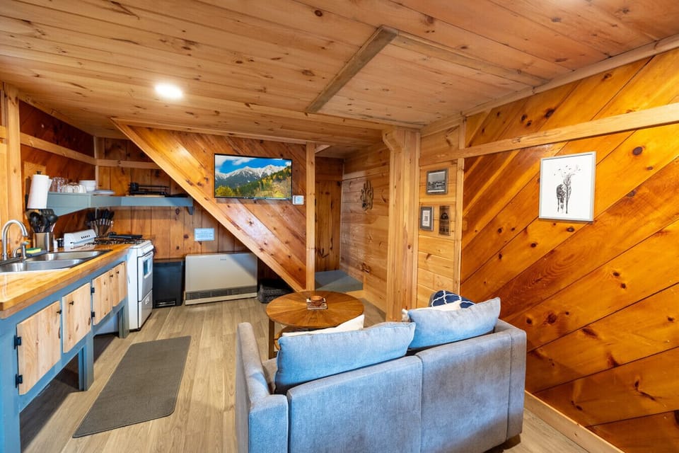 All the comforts of home, surrounded by beautiful cabin craftsmanship.