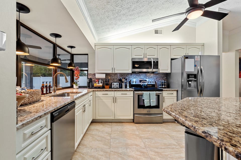 Spacious kitchen with the essential amenities making it easy to whip up a meal