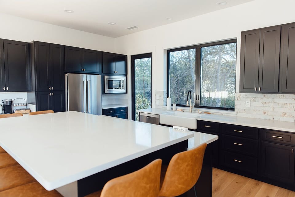 Kitchen with an island that seats 8