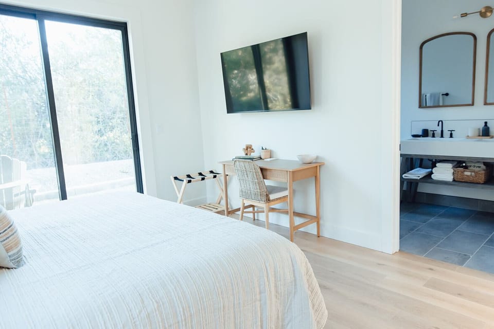 Primary bedroom with desk area 