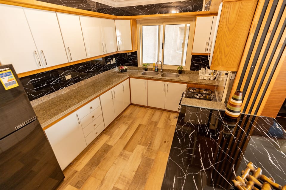 Comfort Apartment | Private kitchen | Full-size fridge, microwave, oven, dishwasher