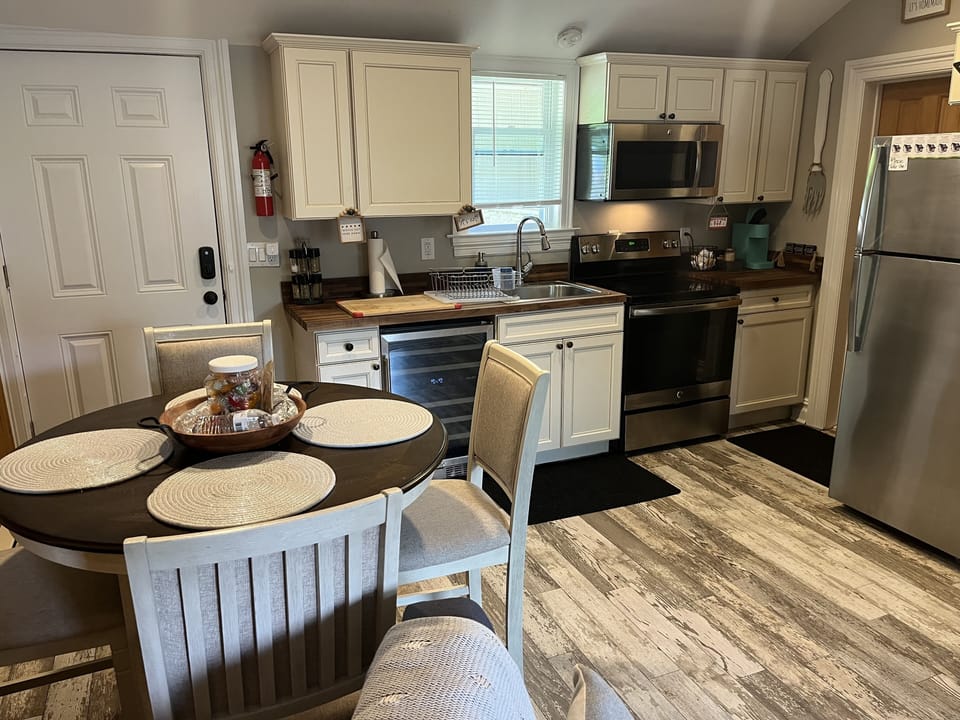 Fully functioning kitchen w full size ref., stove, wine ref. and microwave
