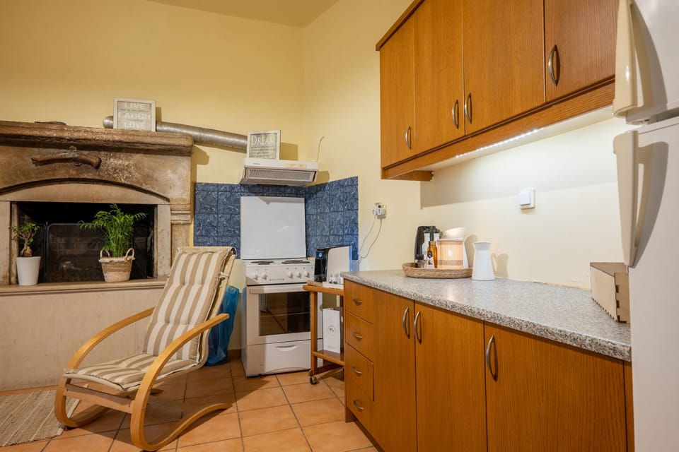 Villa | Private kitchen | Fridge, oven, toaster, highchair