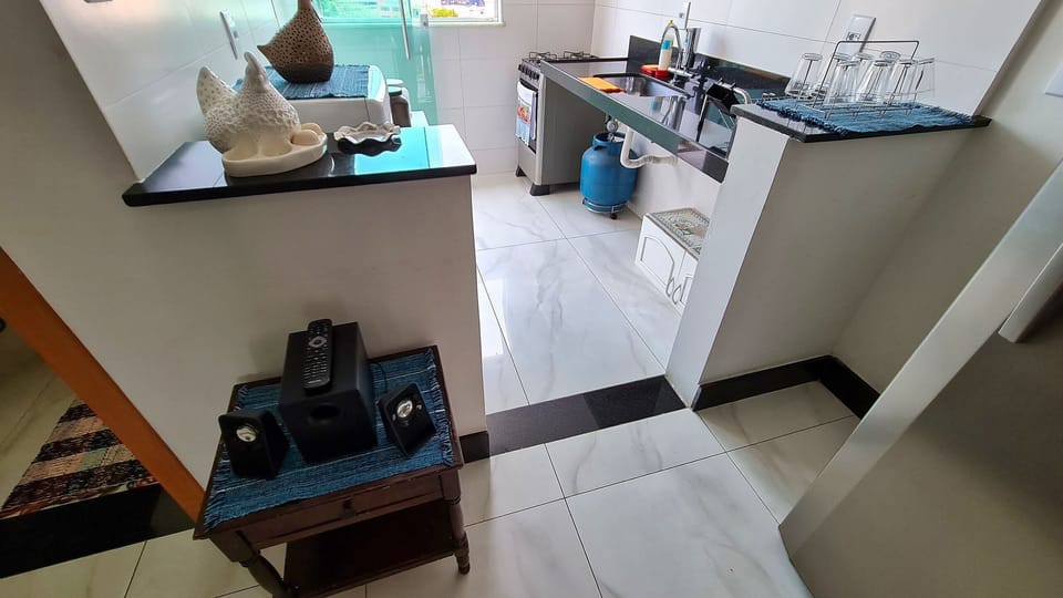 Villa | Private kitchen | Fridge, microwave, oven, blender