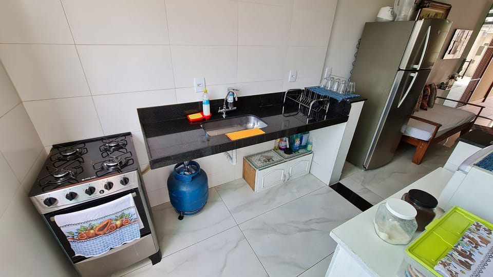 Villa | Private kitchen | Fridge, microwave, oven, blender