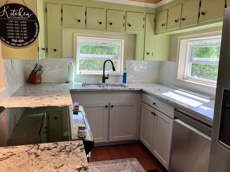 newly remodeled kitchen with all new appliances, dishes, and cookware.
