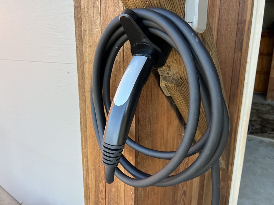 Tesla 220v charger available for use.