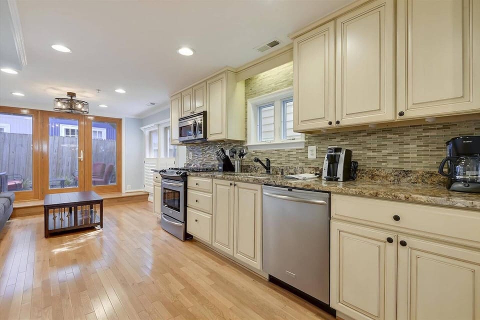 The gourmet kitchen is fully-stocked with cookware, dishes and silverware for up to 8 people.