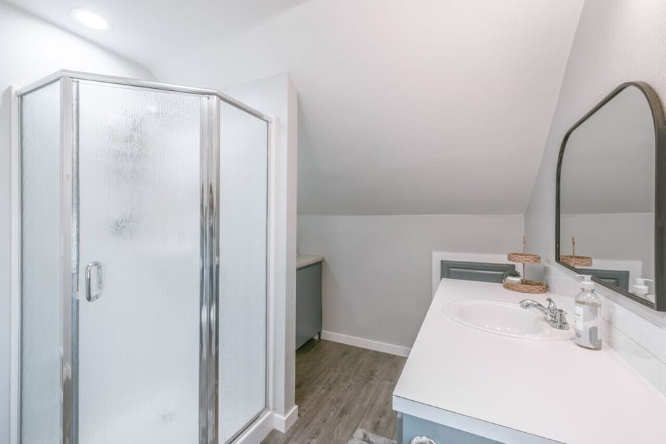 upstairs shower, large bathroom and vanity