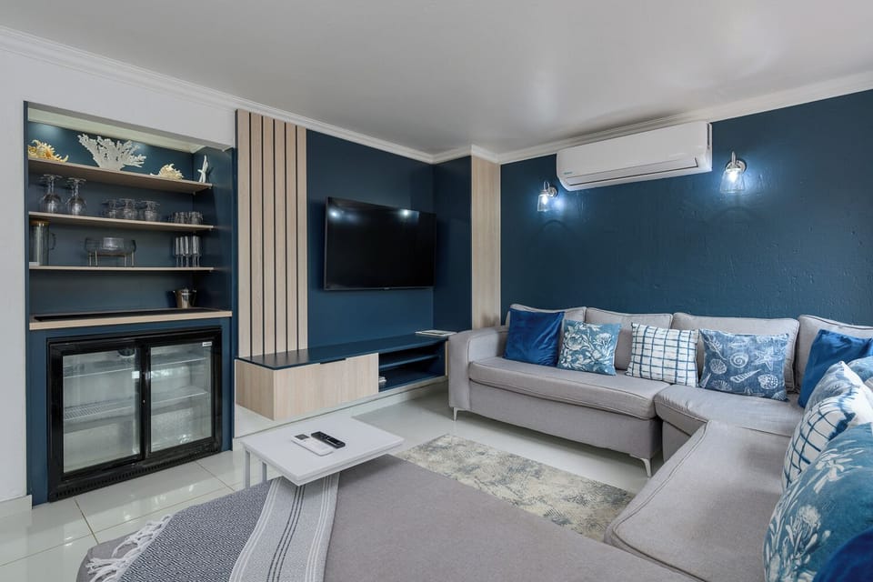 Superior Villa, 4 Bedrooms, River View | Living area | TV