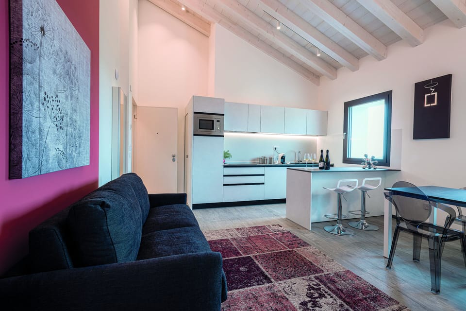 Luxury Condo | Living area | 48-inch flat-screen TV with satellite channels, TV