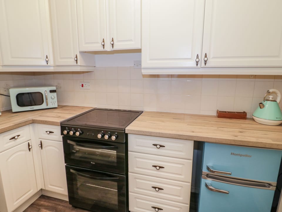 Fridge, toaster, cookware/dishes/utensils