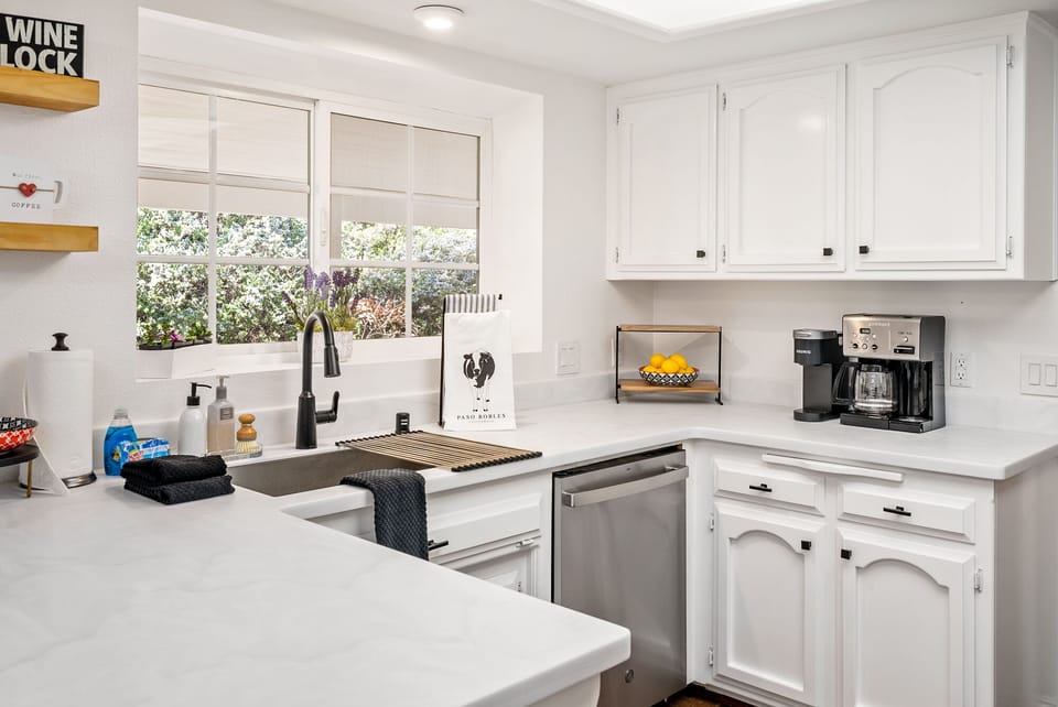 Bright kitchen with a coffee station and under-window sink