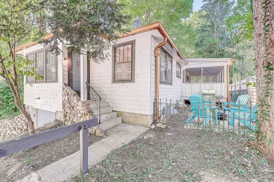 Front of bungalow w the blue front door