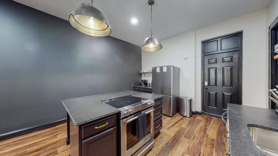 Kitchen: It has well-maintained and modern appliances, always ready to assist you while you're cooking. From the sleek oven and stove to the efficient refrigerator, everything is in excellent condition for smooth and enjoyable meal preparation.