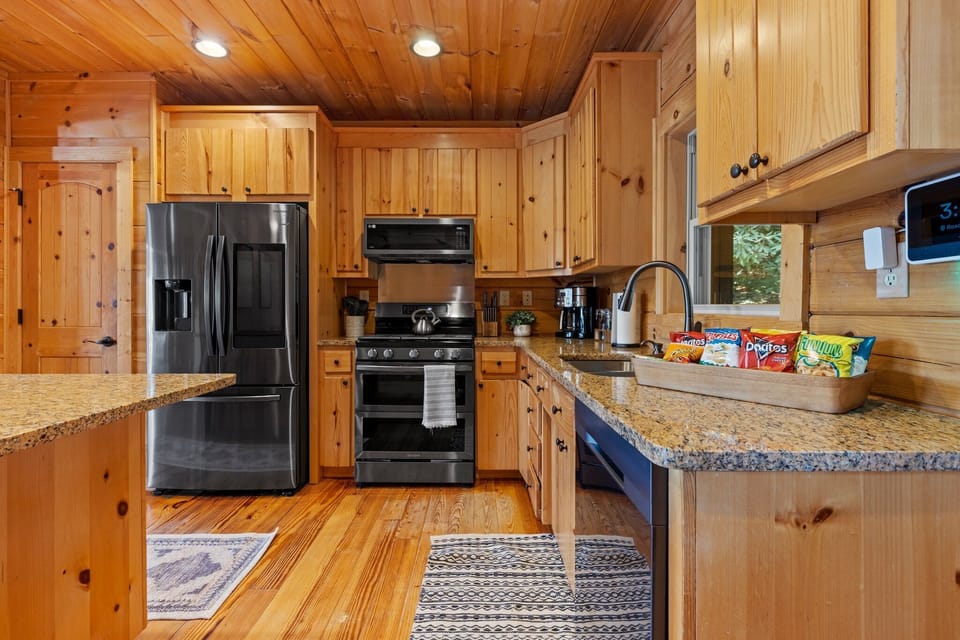 Fully stocked kitchen with smart refrigerator, gas stove, coffee and snacks! 