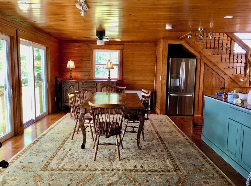 Enjoy the dining area  with full lake views