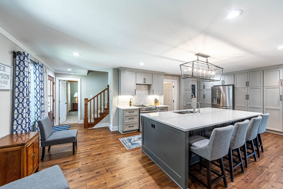 Enjoy this open kitchen plan to prepare a meal but still be part of the crowd.